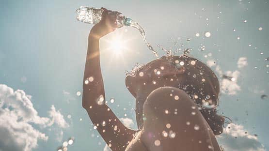 woman cooling off in extreme heat